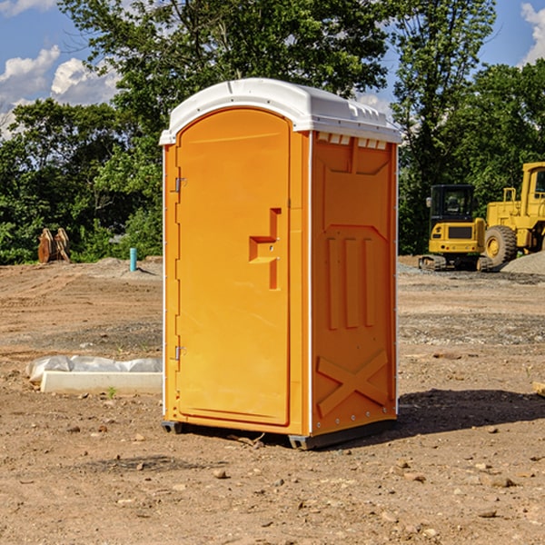 what is the cost difference between standard and deluxe portable toilet rentals in Audubon County IA